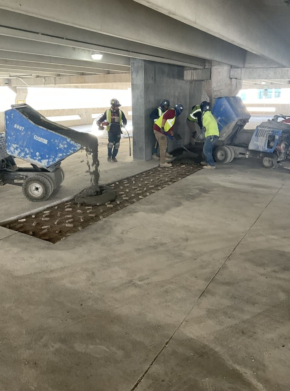 pouring concrete for a parking garage project