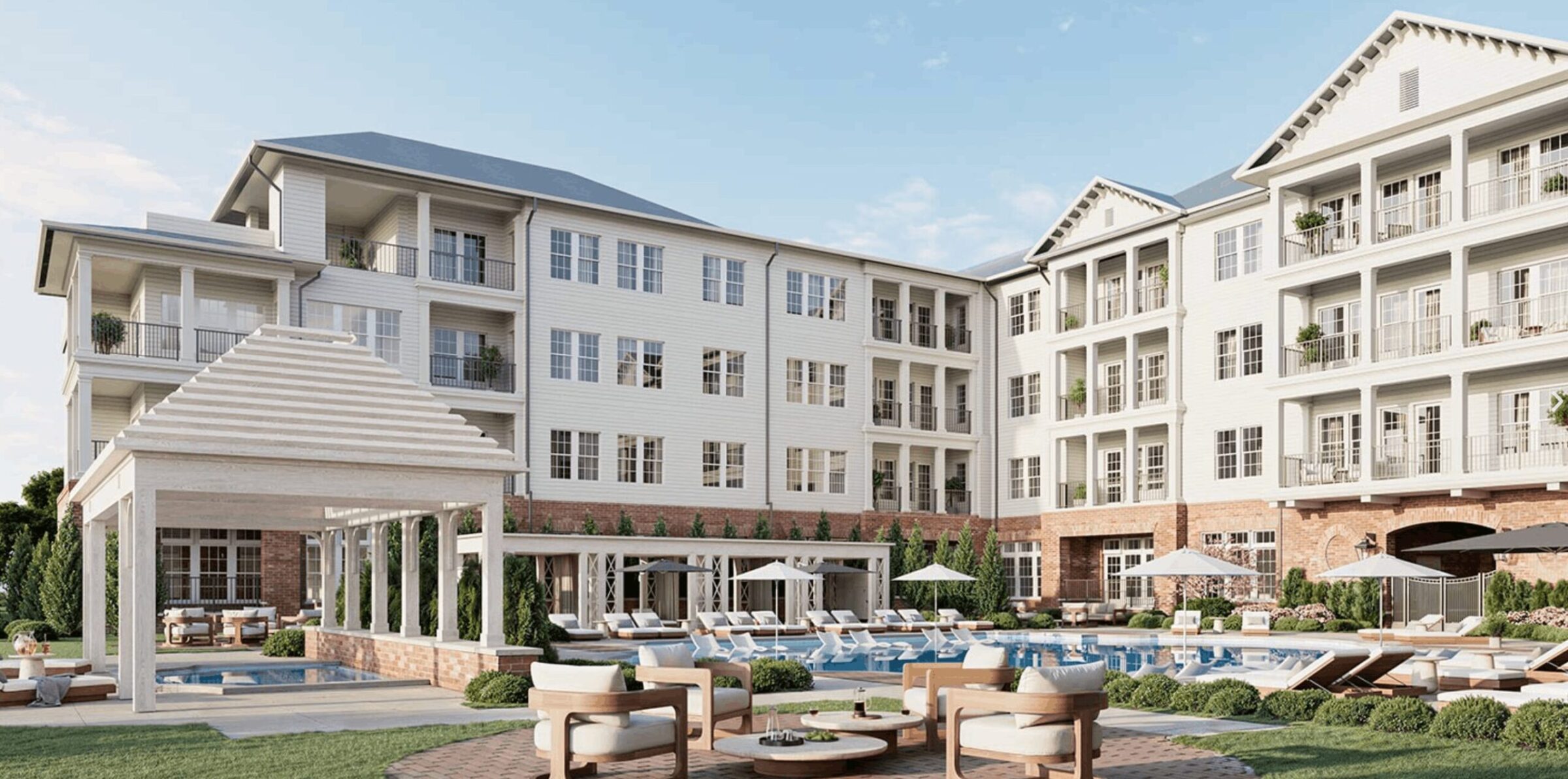 astor club senior living entrance outdoor lounge and pool